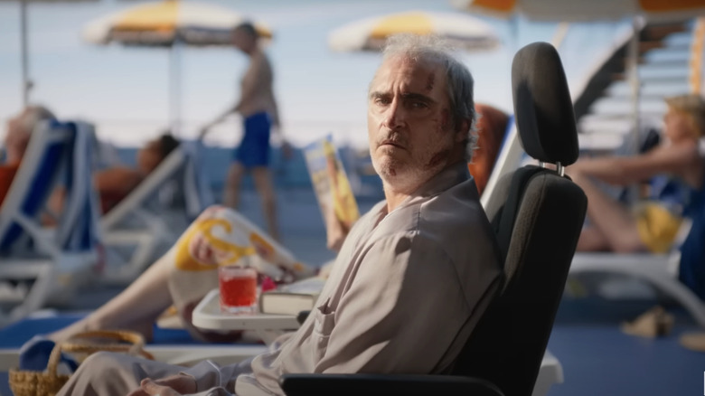 Beau sitting at beach looking