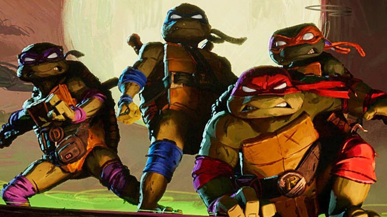 The Turtles standing on rooftop grimacing